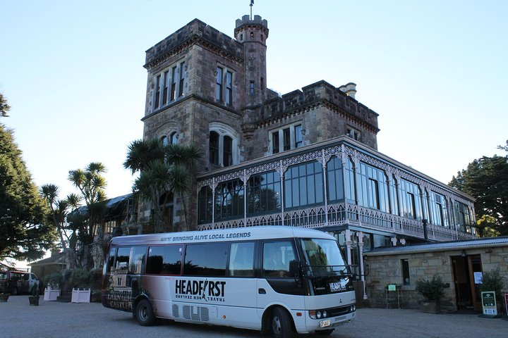 Headfirst bus infront of Castle